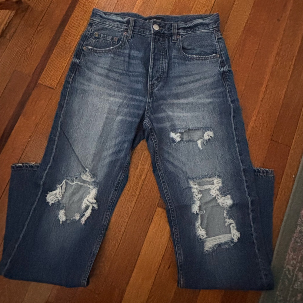 Dark wash destroyed baggy denim